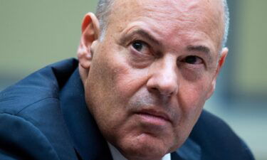 Postmaster General Louis DeJoy testifies during a hearing before the House Oversight and Reform Committee on August 24