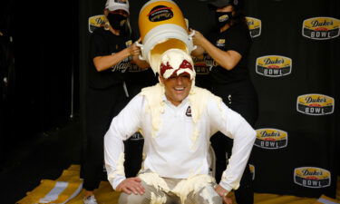 Head coach Shane Beamer of the South Carolina Gamecocks is covered in Duke's Mayonnaise following his team's 38-21 victory over the North Carolina Tar Heels.