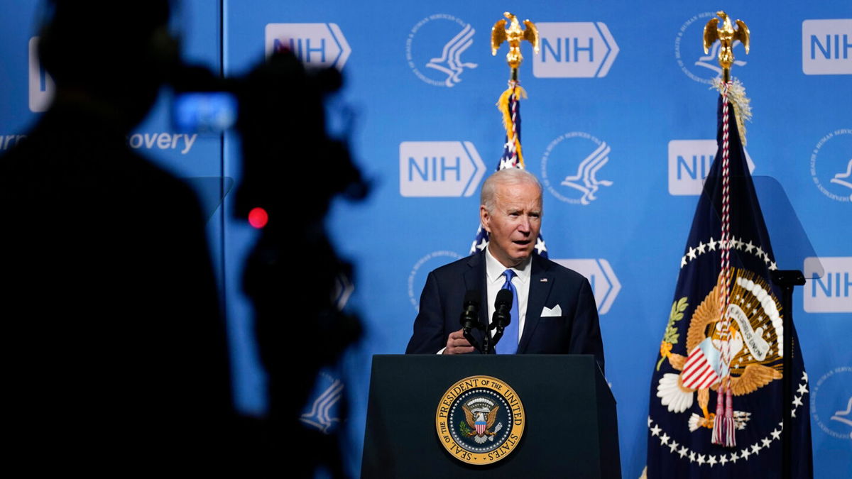 <i>Evan Vucci/AP</i><br/>President Joe Biden speaks about the Omicron varient during a visit to the National Institutes of Health in Bethesda