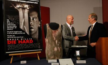 Bruce Willis presenting the National Museum of American History with props from the "Die Hard" series in 2007