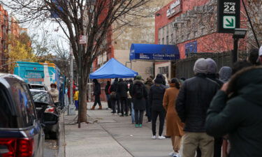 People line up for Covid-19 test and vaccination in New York City