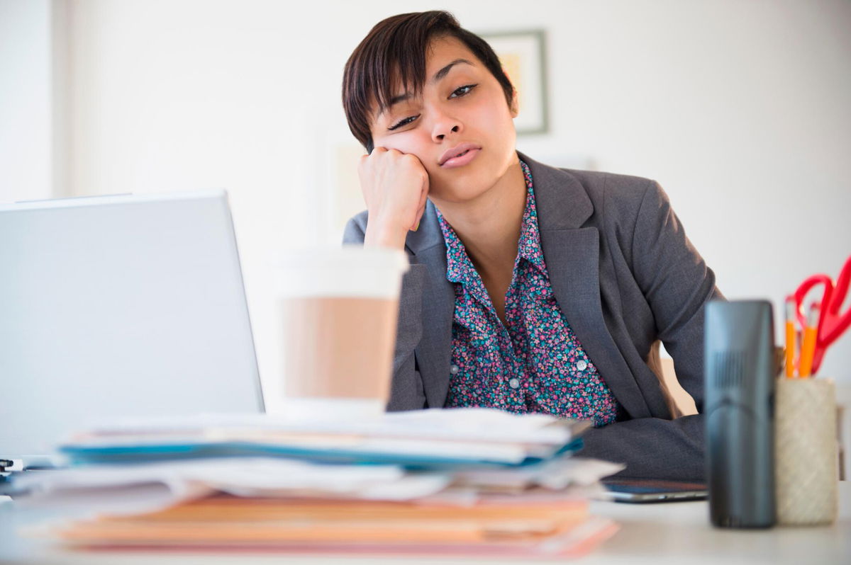 <i>Jamie Grill/Tetra images/Getty Images</i><br/>Taking breaks throughout the day to move and stretch is a highly effective way to beat the afternoon slump.