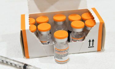 A box of orange-capped kid-size vials of the Pfizer Covid-19 vaccine is seen at a vaccination site for 5 to 11 year-olds in Altamonte Springs