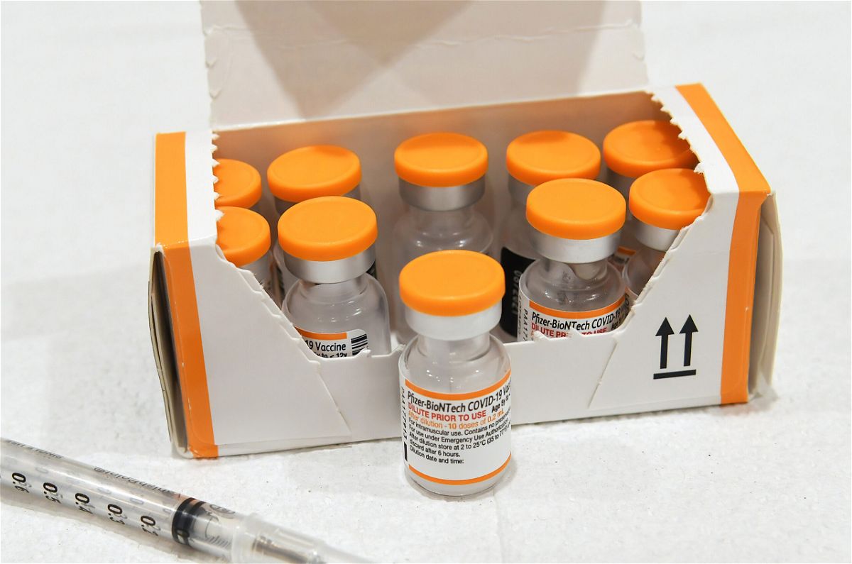 <i>Paul Hennessy/SOPA Images/LightRocket/Getty Images</i><br/>A box of orange-capped kid-size vials of the Pfizer Covid-19 vaccine is seen at a vaccination site for 5 to 11 year-olds in Altamonte Springs
