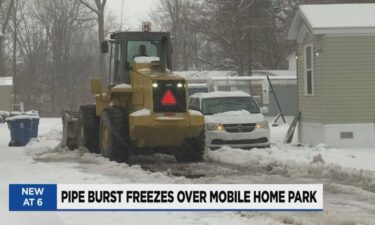 A mid-Michigan community was covered in ice after multiple pipe bursts in two days during a frigid weekend.