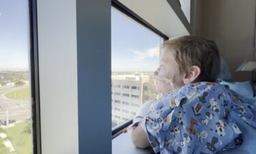 Beau looking out the window seeing the outpouring of support from Miami-Dade police officers.