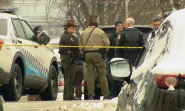 A man who was a trooper with the Illinois State Police and a woman were found shot dead Monday afternoon in a car in the East Side neighborhood of Chicago.