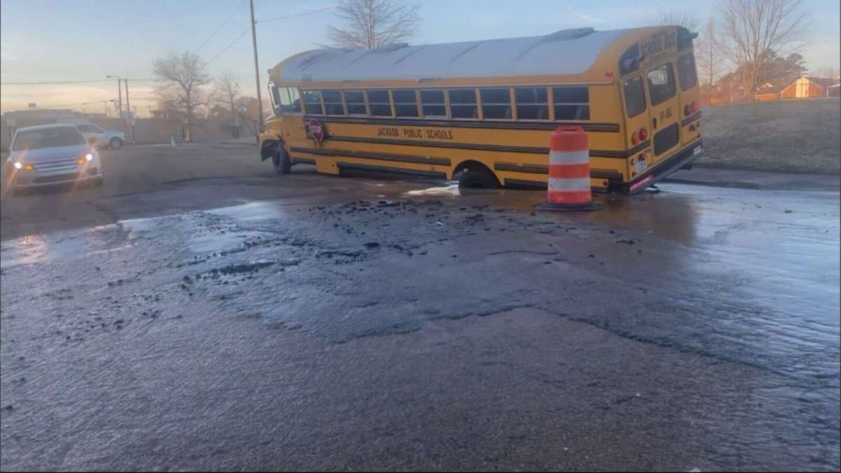 <i>WAPT</i><br/>A Jackson school bus got stuck in a hole on the way to drop off a student at school.