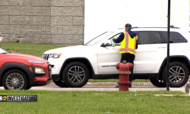 Conmen have been ripping off fans outside Chicago sports venues for years. Posing as parking attendants