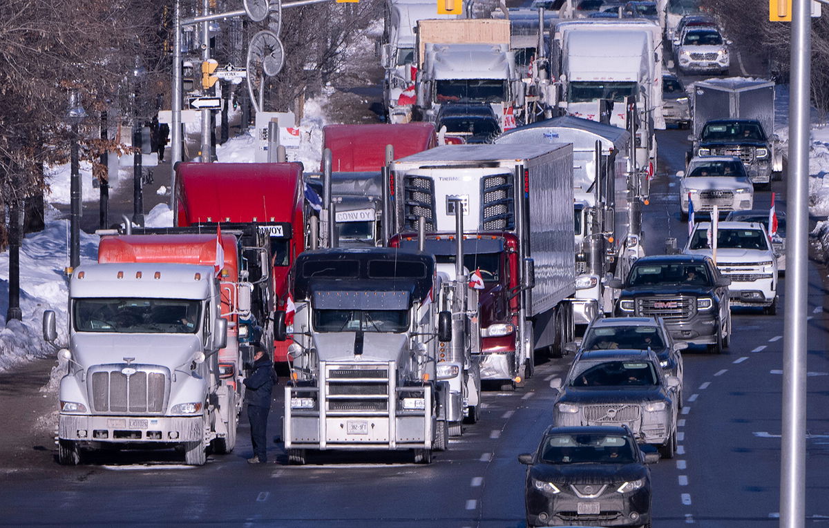 <i>Adrian Wyld/AP</i><br/>Vehicles from the protest are parked