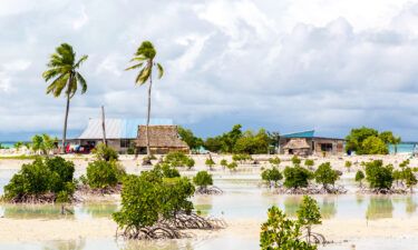 The remote island nation of Kiribati went into lockdown for the first time since the Covid-19 pandemic began two years ago after dozens of passengers on an international flight tested positive for the virus.