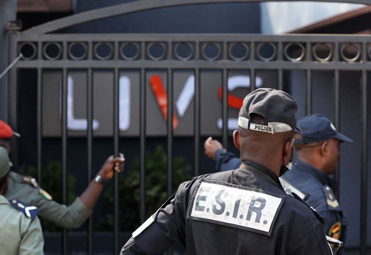 <i>Kenzo Tribouillard/AFP/Getty Images</i><br/>Policemen stand guard at the entrance of the night-club in the Bastos district of Yaounde