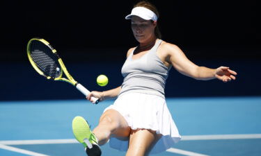 Danielle Collins kicks a ball in frustration in her match against Alize Cornet.