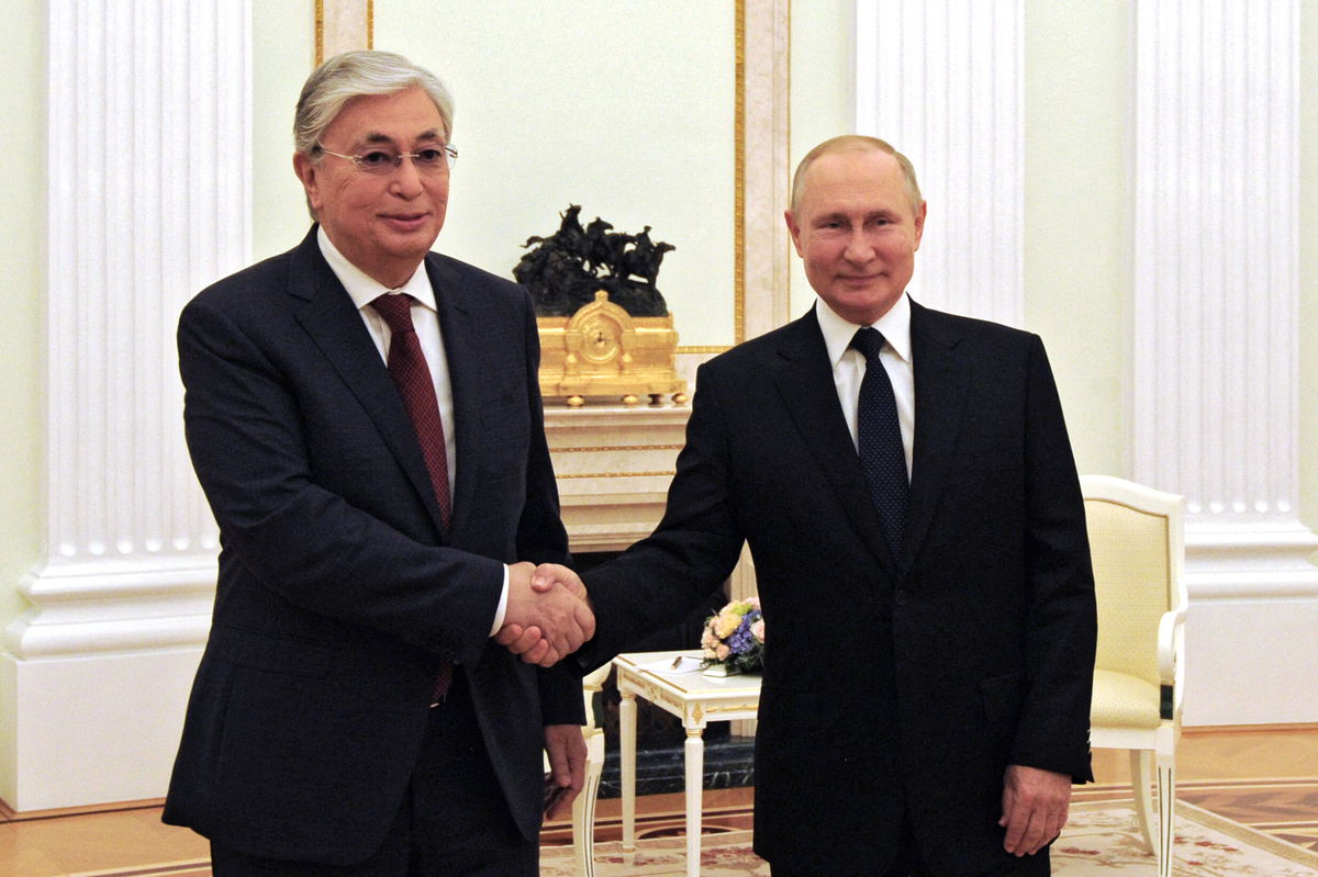 <i>MIKHAIL KLIMENTYEV/AFP/SPUTNIK/Getty Images</i><br/>Russia's President Vladimir Putin greets Kazakhstan's President Kassym-Jomart Tokayev in Moscow on August 21