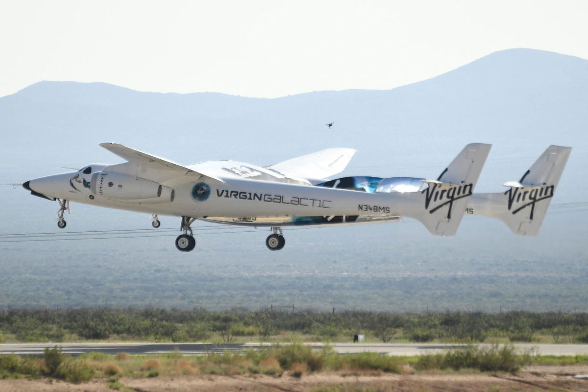 <i>Patrick T. Fallon/AFP/Getty Images</i><br/>Richard Branson takes off on July 11