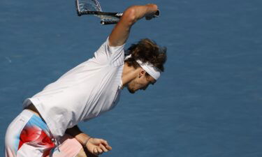 Alexander Zverev smashes his racket in frustration during his fourth round match against Denis Shapovalov.