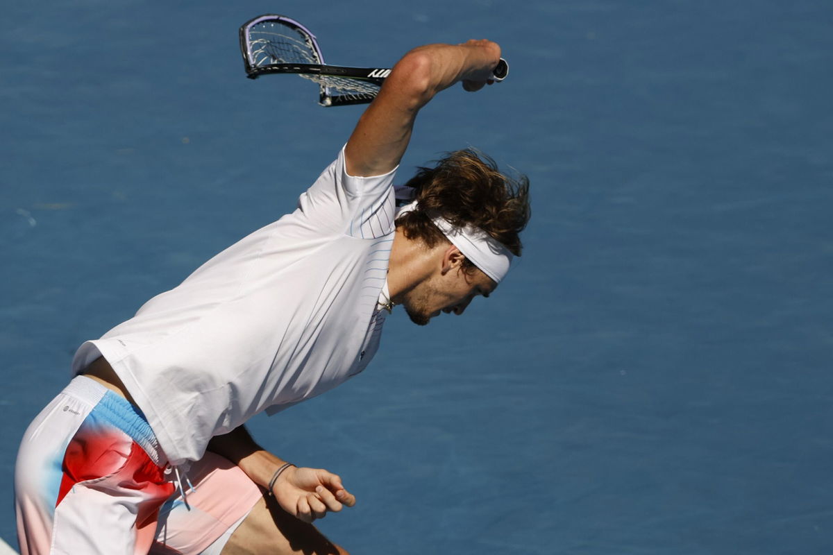 <i>Tertius Pickard/AP</i><br/>Alexander Zverev smashes his racket in frustration during his fourth round match against Denis Shapovalov.