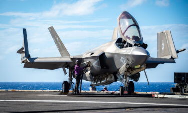 A sailor fuels an F-35C on the flight deck aboard Nimitz-class aircraft carrier USS Carl Vinson on January 19.