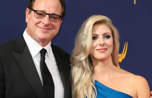 Bob Saget's wife Kelly Rizzo shares an emotional tribute to him. The couple here attends the 2018 Creative Arts Emmy Awards on September 8