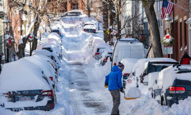 Northeast faces below-freezing temperatures as it recovers from a record breaking weekend snowstorm. Pictured is Boston on Sunday.