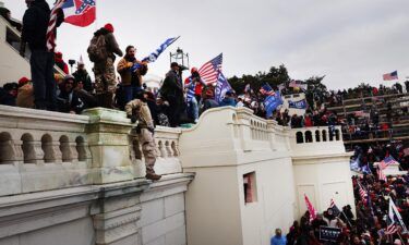 Donald Trump supporters storm the US Capitol following a "Stop the Steal" rally on January 6
