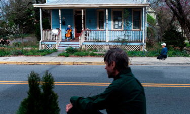 Cellist Jodi Beder performs a daily concert on her front porch in Mount Rainier