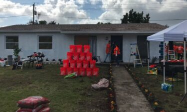 Workers from Home Depot stopped by to help James Holton