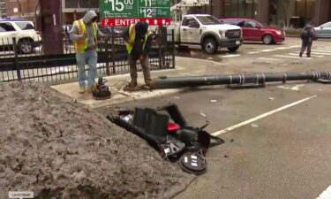 Another rusted-out city pole fell into a busy Chicago intersection Thursday