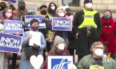 Library workers hold a ‘Fill the Library with Love’ rally after disruptive protests.