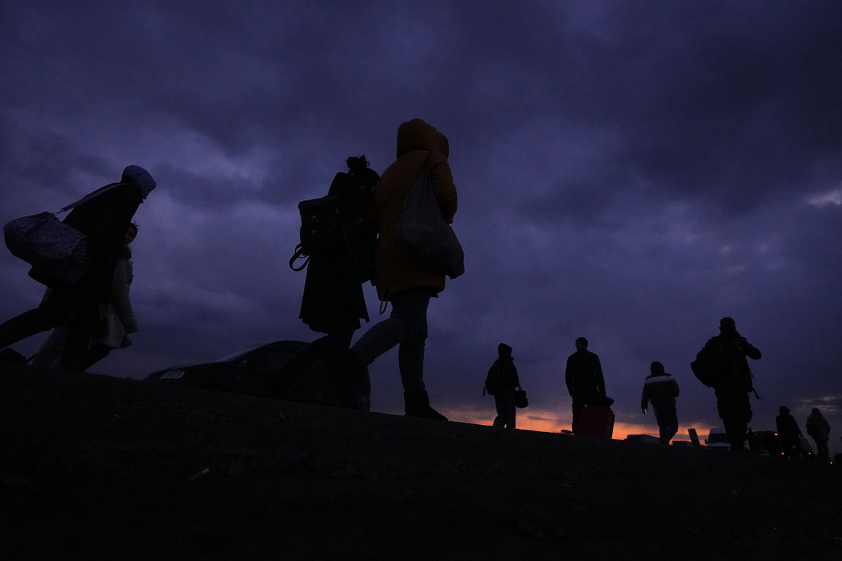 Airbnb is offering free short-term housing for up to 100,000 Ukrainians who have been displaced by the war with Russia, the company announced Monday. Refugees are shown here arriving in Przemysl, Poland, Saturday, Feb. 26, 2022.belongings in the other, leaders in Poland, Hungary, Bulgaria, Moldova and Romania are offering a hearty welcome. (AP Photo/Petr David Josek, File)