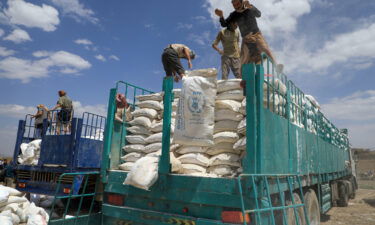 Yemen's Houthi rebels dispose of expired aid packages from the World Food Programme (WFP) in the capital Sanaa in 2019.