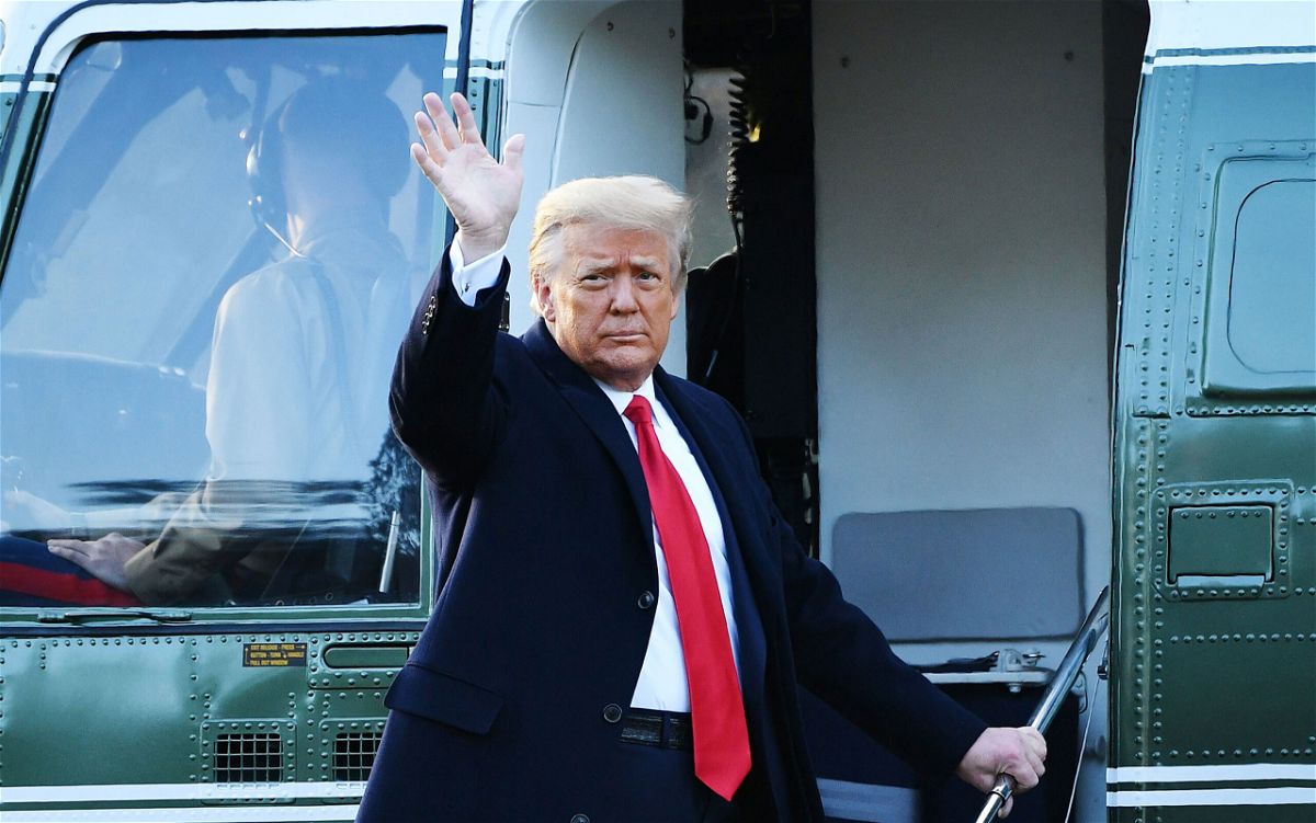 <i>MANDEL NGAN/AFP via Getty Images</i><br/>Outgoing US President Donald Trump waves as he boards Marine One at the White House in Washington