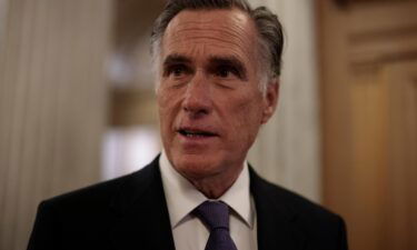 Republican Sen. Mitt Romney of Utah on Sunday blasted his fellow GOP members who attended a White nationalist event and those who support Russia President Vladimir Putin as the country invades Ukraine. Romney is shown here outside the Senate Chambers of the Capitol during a vote on December 06