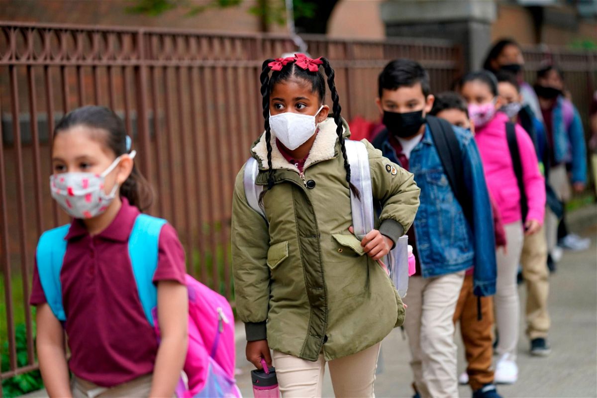 <i>Seth Wenig/AP</i><br/>As states plan to lift school mask mandates