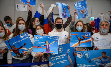 Supporters of Valieva await the figure skater's arrival at the Sheremetevo airport outside Moscow.