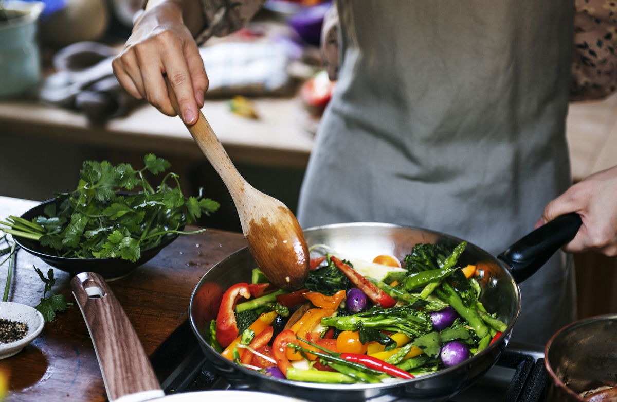 <i>Rawpixel.com/Adobe Stock</i><br/>Eating vegetables