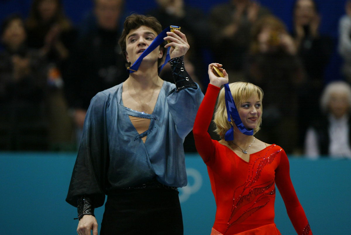 <i>Robert Laberge/Getty Images</i><br/>Elena Berezhnaya and Anton Sikharulidze of Russia celebrate gold at the Salt Lake City Winter Olympics.