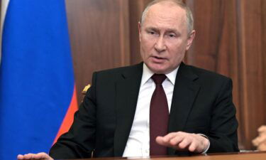 Russian President Vladimir Putin speaks during his address to the nation at the Kremlin in Moscow on February 21.