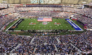 Aerial view of the US flag on field during anthem before Los Angeles Rams vs Cincinnati Bengals Super Bowl LVI game at SoFi Stadium in Inglewood