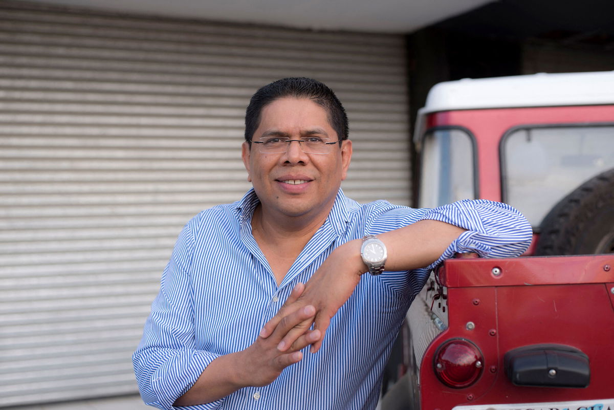 <i>Oscar Navarrete/AFP/Getty Images</i><br/>Nicaraguan radio broadcasting sports journalist Miguel Mendoza poses for a picture in Managua on August 15