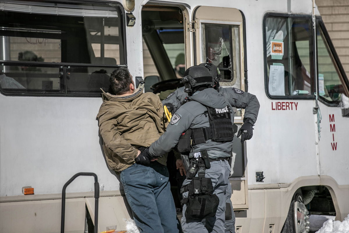 <i>Amru Salahuddien/Anadolu Agency/Getty Images</i><br/>Canadian authorities carried out a massive operation at Ottawa's city center for protesters and trucks Friday.