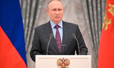 Russian President Vladimir Putin addresses media on February 22 at the Kremlin in Moscow