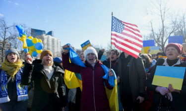 Demonstrators protest against Russia's invasion of Ukraine in front of the State House on Sunday in Boston.