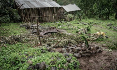 A mass grave for victims that were killed in an alleged massacre is seen in the village of Chenna