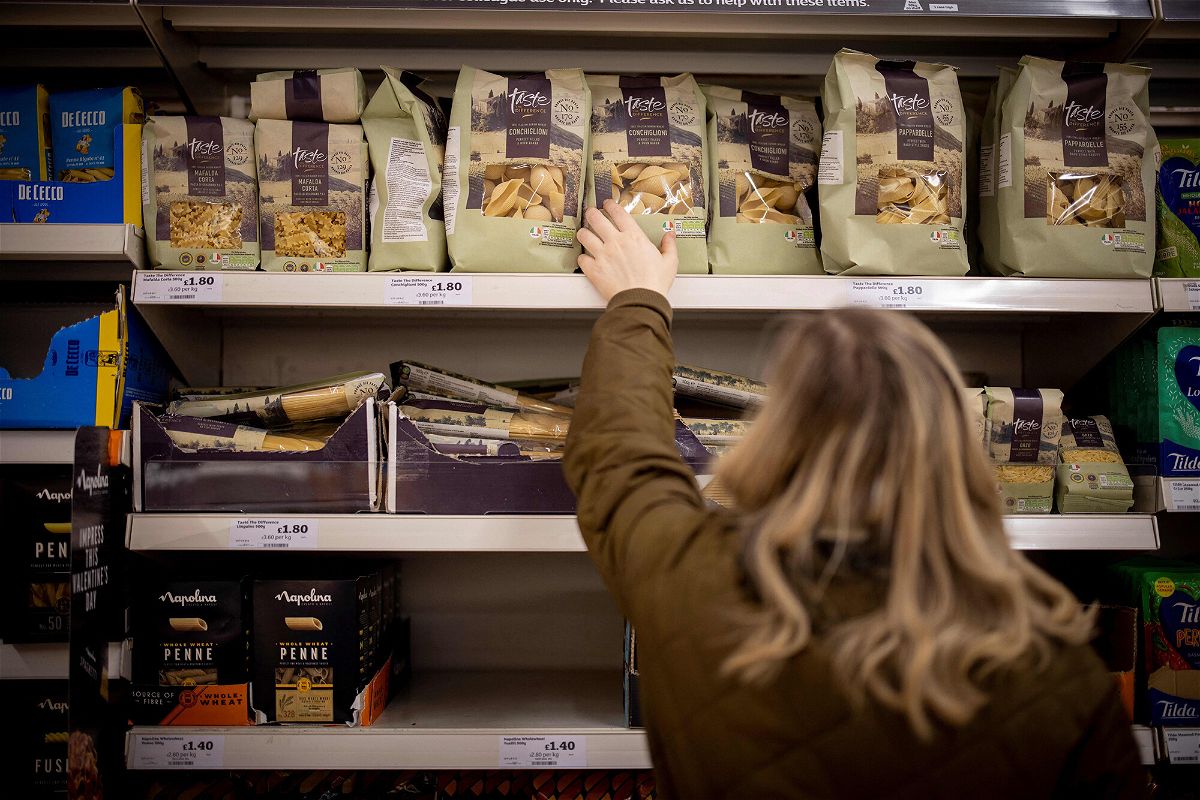 <i>Tolga Akmen/AFP/Getty Images</i><br/>A customer shops for pasta at a Sainsbury's supermarket in Walthamstow