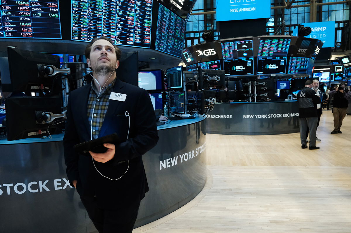 <i>Spencer Platt/Getty Images</i><br/>Solid earnings season wasn't enough to calm investors. Traders here work on the floor of the New York Stock Exchange on February 18