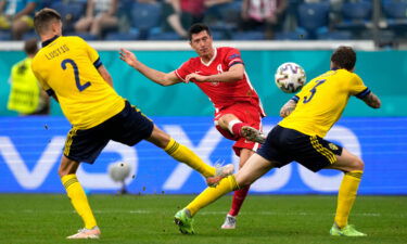 Lewandowski scores against Sweden in their Euro 2020 clash.