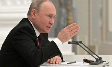 Russian President Vladimir Putin chairs a Security Council meeting in Moscow