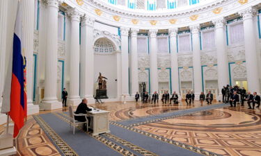 Russian President Vladimir Putin chairs a meeting of the Security Council on February 21.