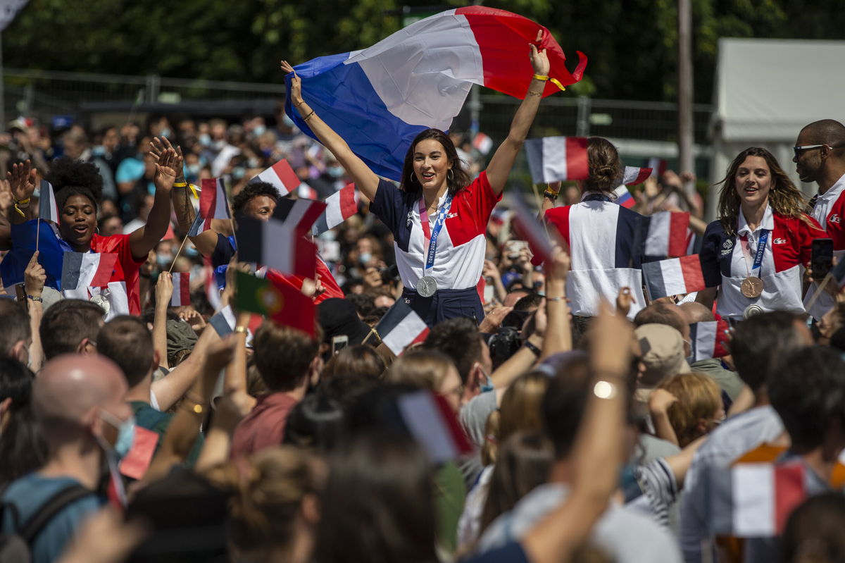 <i>Siegfried Modola/Getty Images</i><br/>A crowd during the Olympic Games handover ceremony on August 8